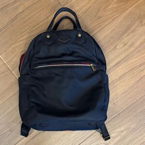 MZ Wallace Navy Backpack with Red and Gold Details